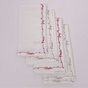 NWOT Ridgefield Home set of 4 white Christmas Peace Joy Merry Noel Cheer napkins